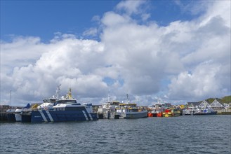 Supply ships for the wind power off-shore plants, catamarans, offshore island of Helgoland, blue