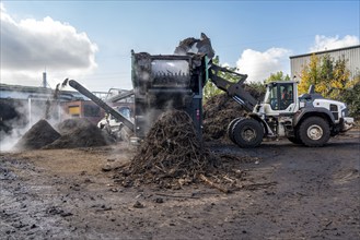 Composting plant, organic waste is composted, sorted by size, smaller parts are reused as compost,