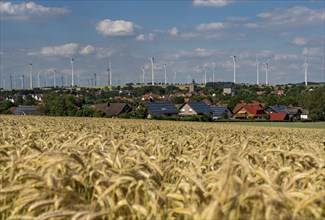 Wind farm near the East Westphalian town of Energiestadt Lichtenau, many residential buildings with