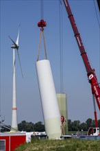 Repowering of a wind farm near Issum, here the dismantling of the tower, 9 older wind turbines from