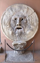 The Bocca della Verita, Mouth of Truth is a disc-shaped relief, in the portico of the Santa Maria