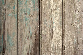 Old wooden door with peeling paint, texture, background, Apulia, Italy, Europe