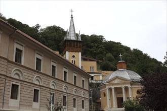 Banat, spa, Hercules bath, Baile Herculane, houses and church in the old town centre, Romania,