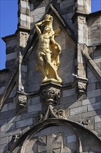 Historic guild house with golden figure on the façade, Grote Markt, historic city centre, Antwerp,