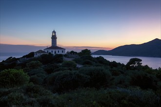 Lighthouse on a hill at sunset with a view of the sea and the surrounding area, Lastovo, Neretva,