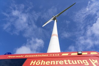 Height rescuers from the Gelsenkirchen fire brigade practise abseiling from a wind turbine from a