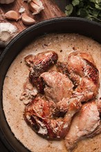 Shkmeruli, fried chicken, in milk-garlic sauce, Georgian cuisine, homemade, close-up, no people