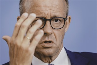 Friedrich Merz, CDU party chairman, at the Federal Press Conference on the consequences of Solingen