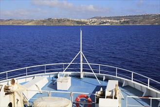 Bow of Gozo Channel Line ferry ship approaching Mgarr, Gozo, Malta, Europe