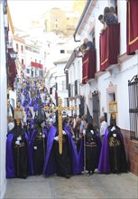 Easter Christian religious procession through streets of Setenil de las Bodegas, Cadiz province,