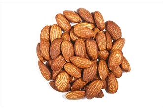 Pile of sweet almond nut isolated on white background. Top view