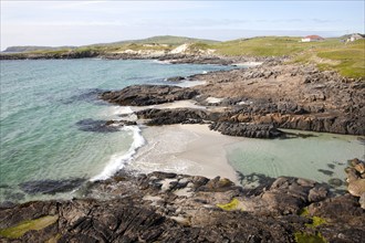 Atlantic coastline rocky headlands and small sandy bays near Borgh, Barra, Outer Hebrides,