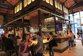 Customers inside Mercado de San Miguel market, Madrid city centre, Spain, Europe