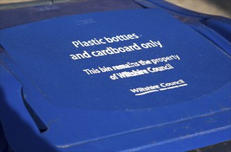 Blue recycling bin for plastic bottles and cardboard only, Wiltshire Council, England, UK