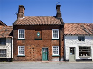 Historic buildings in the town of Holt, north Norfolk, England, United Kingdom, Europe