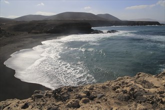 Black sand beach at the coastal village of Ajuy, Fuerteventura, Canary Islands, Spain, Europe