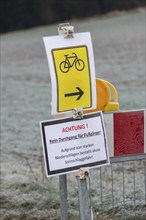 Barrier due to flooding and danger of falling rocks, barrier, landslide, traffic signs, attention