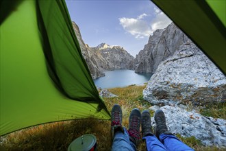 Wild camping, camping in the wilderness with a tent, Kol Suu mountain lake, Sary Beles Mountains,