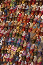 Small babouche magnets on a market, shoes, painted, trade, market, trader, bazaar, offer,