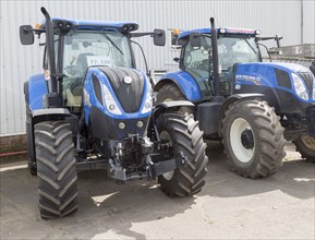 New Holland tractors agricultural machinery on sale, Ernest Doe farm equipment supplier business,