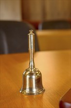 Close-up of a hand bell used, for example, in meetings, committees or courtrooms (here: council