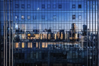 Glass surface facade mirroring an iconic skyline in evening light, AI generated