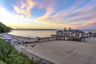 The pier of Sellin, evening mood, sunset, 394 metres long, with restaurant, jetty, beach chairs,