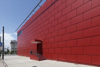 Façade with red panels made of high-pressure laminate, discotheque, nightclub on Piraeus Street,