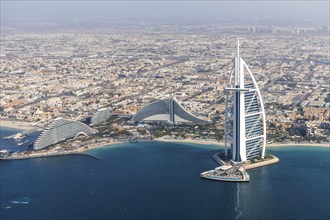 Dubai Burj Al Arab luxury hotel aerial view aerial view by the sea from above in Dubai, United Arab