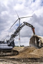 Demolished tower of a 20 year old wind turbine, in the Werl wind farm, 5 old Enercon E-66 turbines