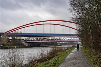 Dilapidated A42 motorway bridge (red arches) over the Rhine-Herne Canal, with massive structural