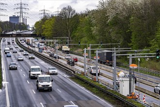 Weighing and barrier system on the A42 motorway, in front of the dilapidated motorway bridge over