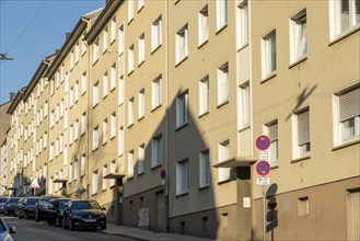 Row of houses, similar facade of apartment blocks, in Wuppertal, North Rhine-Westphalia, Germany,