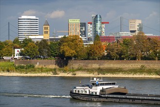 The skyline of Düsseldorf, with the skyscrapers in the Media Harbour, Rhine bridges, residential