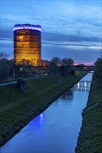 Neue Mitte Oberhausen, Gasometer exhibition hall, after renovation, Emscher River, evening