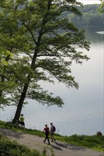 Hiking along the Ruhr, riverside path on Lake Baldeney in Essen, North Rhine-Westphalia, Germany,