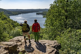 Hiking on the Baldeney Steig, a hiking trail around Lake Baldeney in Essen, a Ruhr reservoir, over