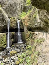 Hiking trail with waterfall on the Levada Nova and Levada do Moinho, Madeira, Portugal, Europe