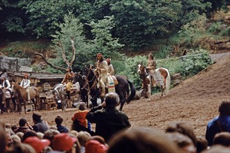 Pierre Brice as Winnetou and other actors riding horses in The Treasure in Silver Lake, Karl May