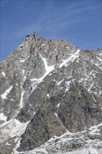 Steep rocky mountain peak, summit of the Aiguille du Midi, Chamonix, Haute-Savoie, France, Europe