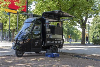 Small coffee trolley in the park under shady trees, Vienna