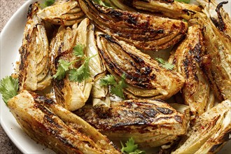 Baked, oven-baked fennel, with spices, in olive oil, homemade, no people