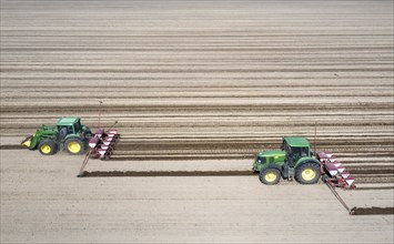 Aerial view, tractors sowing sunflower seeds, Thyrow, 21.04.2023