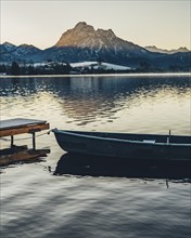 Frosty morning atmosphere during sunrise at Lake Hopfensee in the Allgäu in Bavaria, Germany,