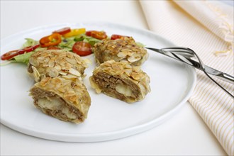 Swabian cuisine, meatballs wrapped in almonds, mixed minced meat, meatballs filled with cheese,