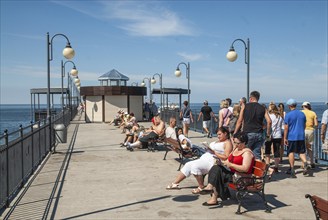 People on the pier in Miedzyzdroje, Western Pomerania, Baltic Sea, Poland, East Europe, Europe