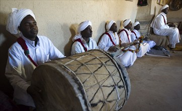 Morocco, traditional musicians with instruments, Pigeons du Sable group, Merzouga, Erg Chebbi