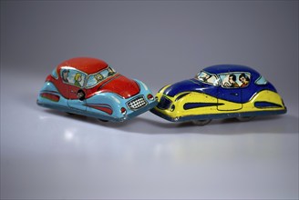 Road traffic, automobile, collision, shown with model cars made of sheet metal