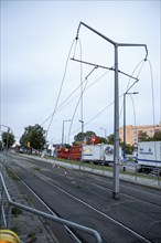 The tram overhead line is torn down after the partial collapse of the Carola Bridge in Dresden,