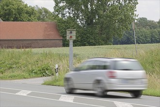 Stationary speed camera and car, speed monitoring, North Rhine-Westphalia, Germany, Europe